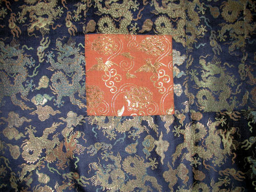 Seven column kesa with design of dragons, clouds, and flaming jewels