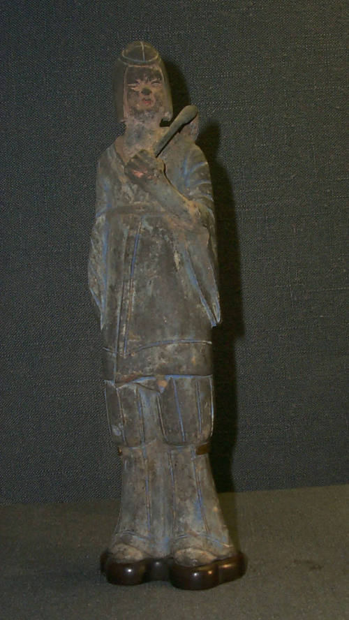 Figure Carrying a Fly Whisk
