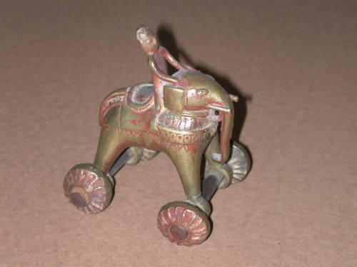 Monkey Riding an Elephant