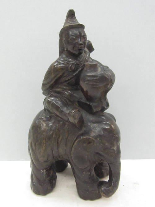 Figure Riding Elephant