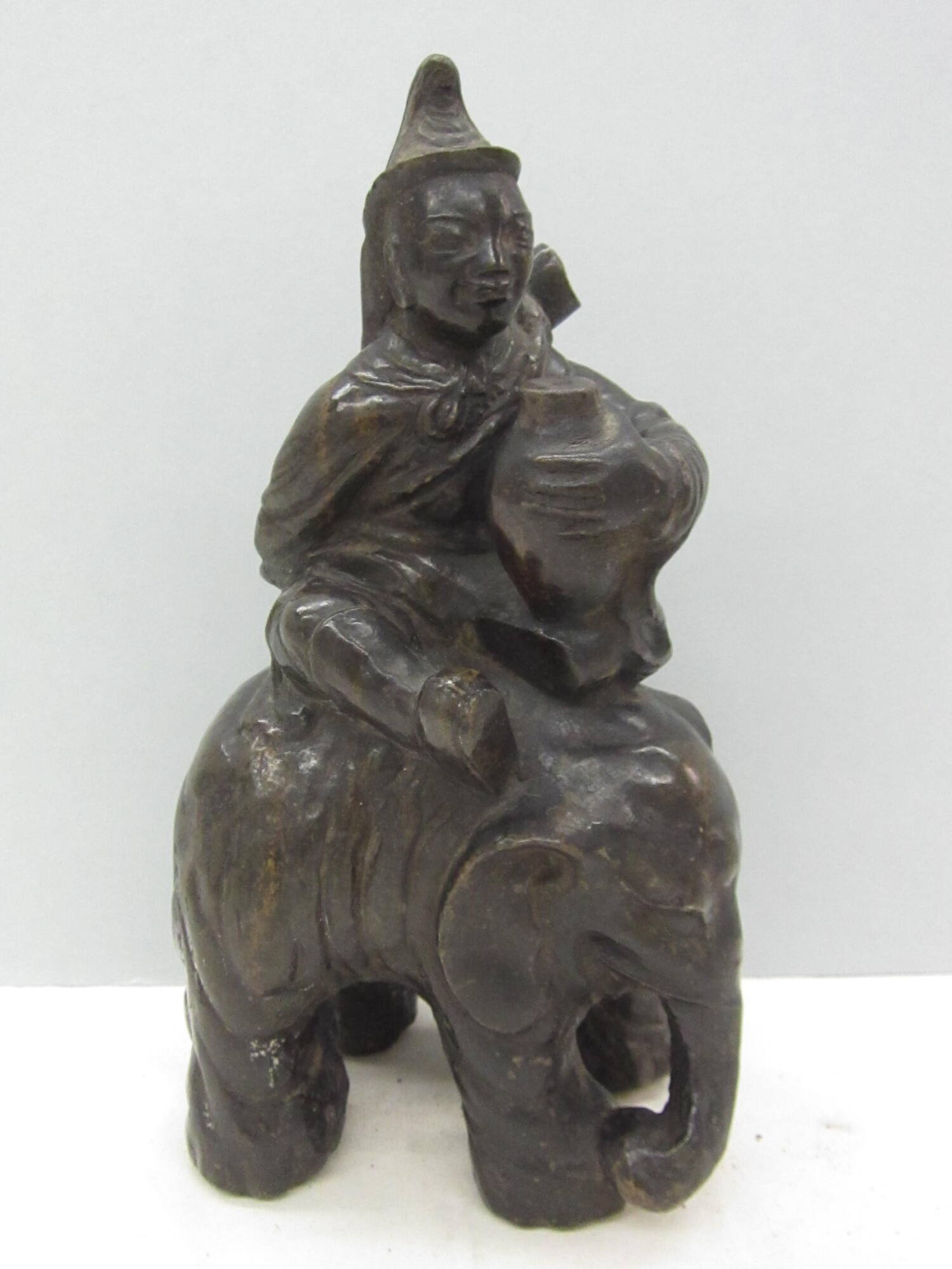 Figure Riding Elephant