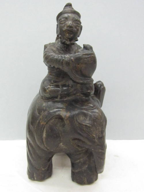 Figure Riding Elephant