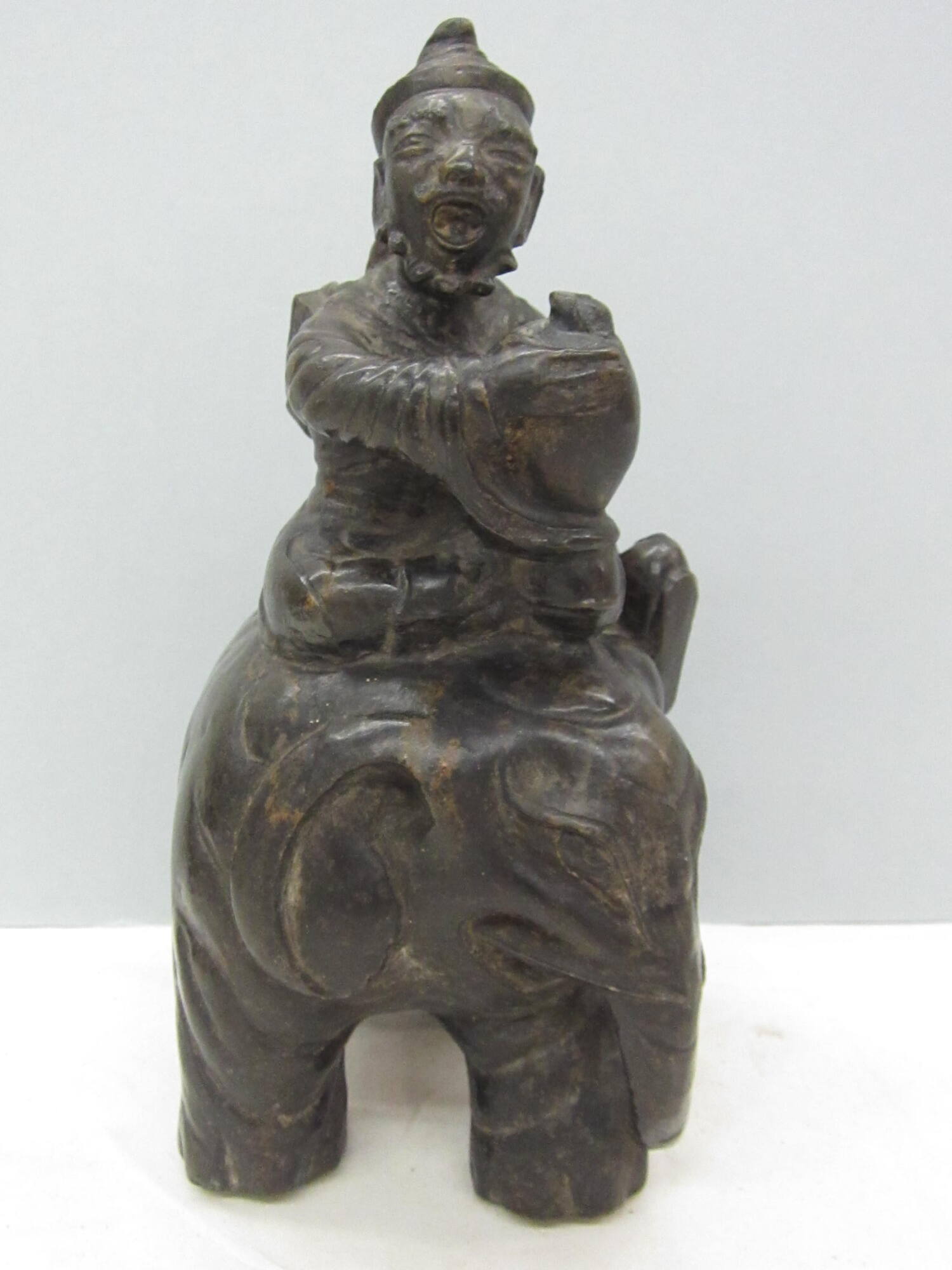 Figure Riding Elephant