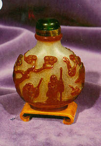Snuff bottle, stopper, and stand