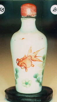 Snuff bottle with spoon, stopper, and stand