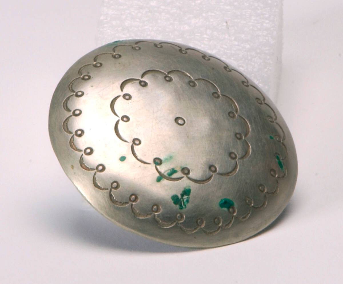 Disc from a woman's belt