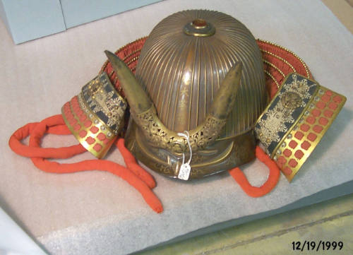Helmet adorned with animal horns finial