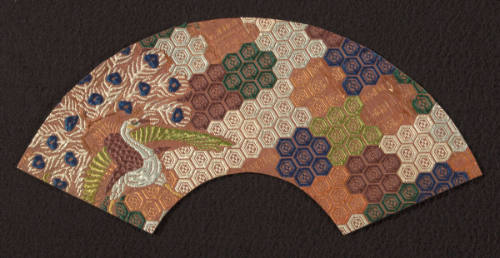 Fan-shaped fragment from atsuita type No robe with hexagonal tortoise design and cranes