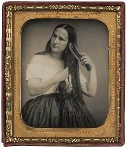 Woman Brushing her Hair