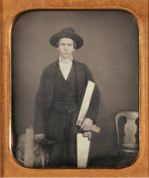 Carpenter with T-Square and Saw