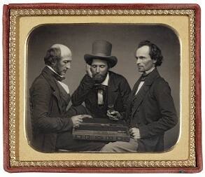 Three Men Playing Backgammon