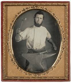 Blacksmith with Raised Hammer