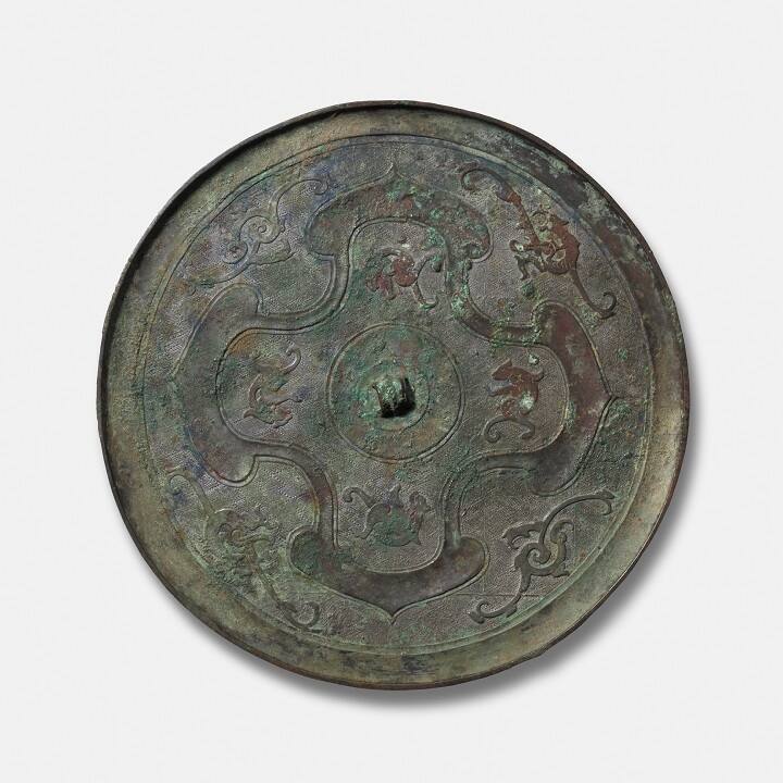 Mirror with Beasts and Geometric Patterns