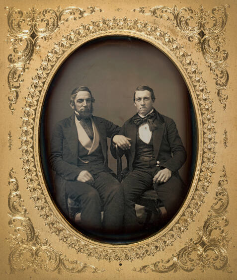 Two Seated Men