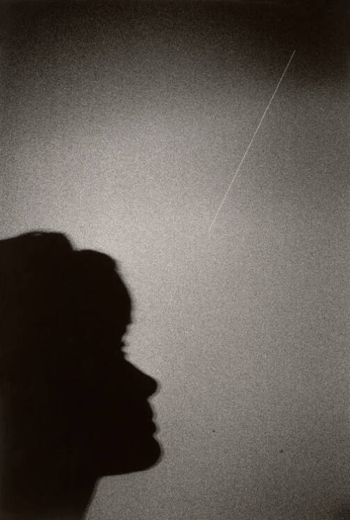 Mrs. Gordon Cooper watches her husband pass overhead in Gemini capsule