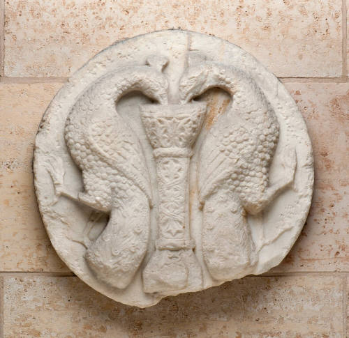 Roundel with depiction of two addorsed peacocks drinking from a font