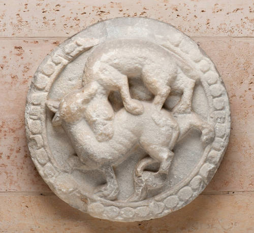 Roundel with depiction of animals in combat