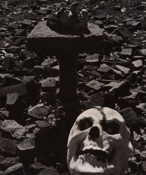 [Skull and masks outdoors]