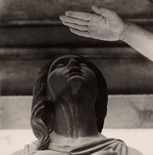 [Cemetery statue and hand]