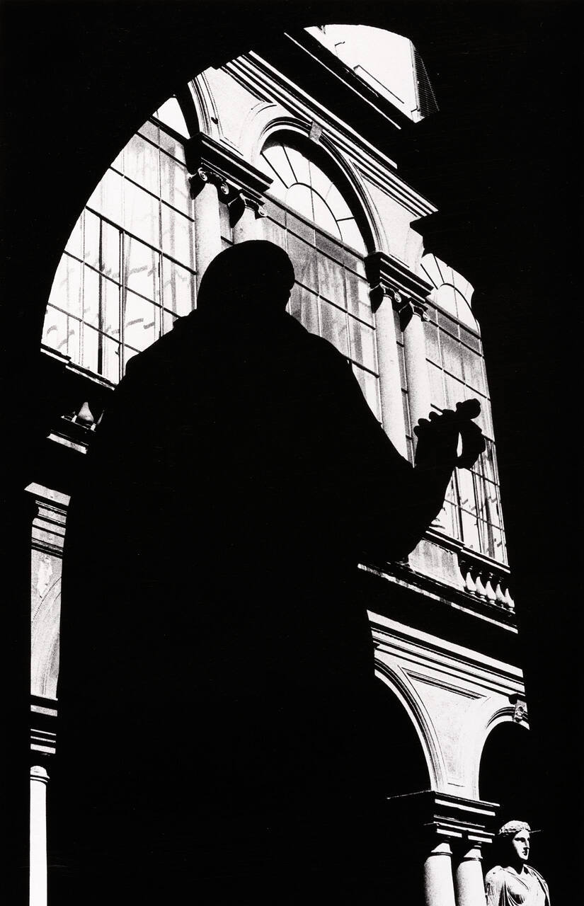 Statue Silhouetted in Court