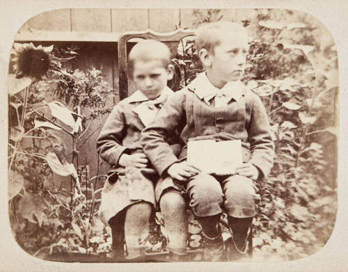 Untitled (two boys in back yard)