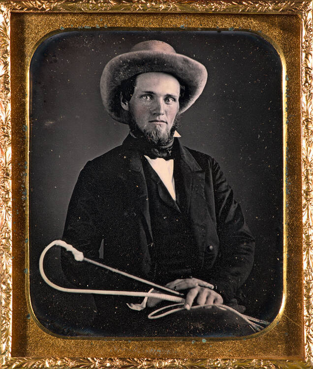 Man with buggy whip