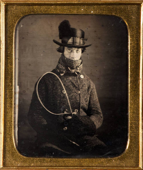 Coachman in riding gear