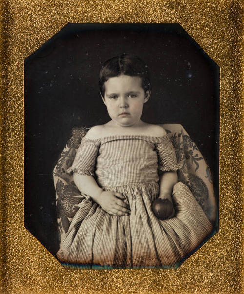 Girl holding apple