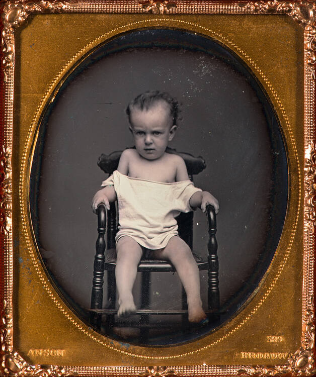 Half-dressed boy