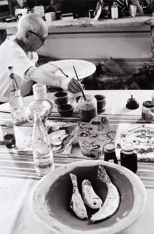 Picasso at work on another plate