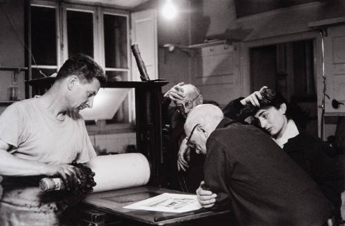 Jaime Sabartés, Jacques Frélaut (master printer), Jacqueline and Picasso examining aquatint proof, basment of La Californie