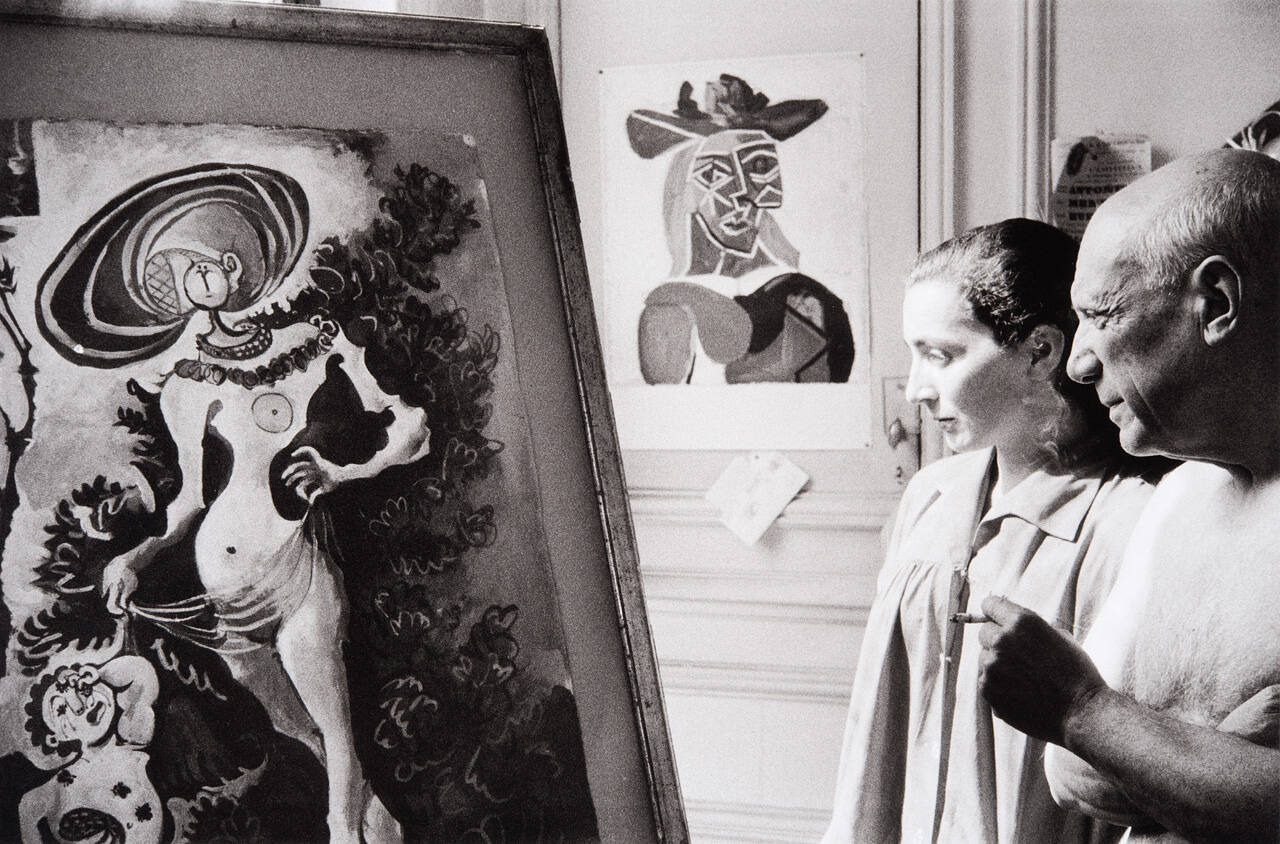 Picasso and Jacqueline looking at Venus and Cupid