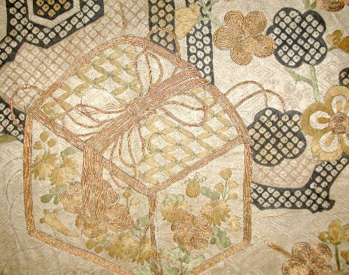 Fragment from kosode with design of standing plum tree (tachiki) and gift-wrapped boxes