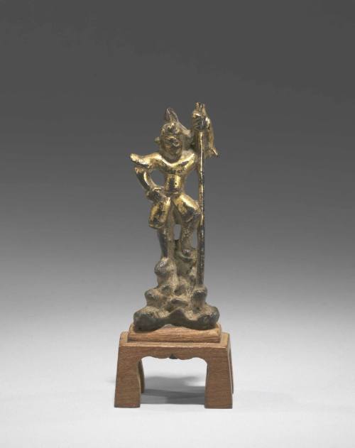 Guardian Figure in Full Armor on a Demon