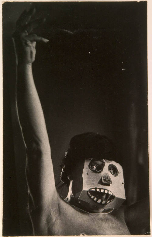 Picasso Wearing Cardboard Mask