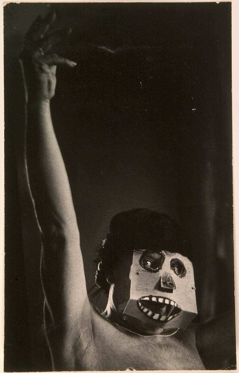 Picasso Wearing Cardboard Mask