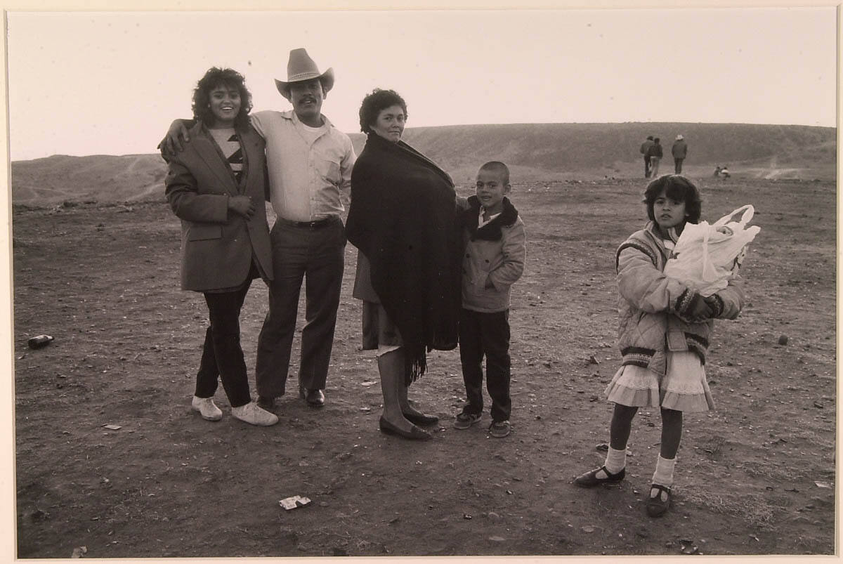 Family Preparing to Run the Border