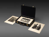 case displayed with three prints