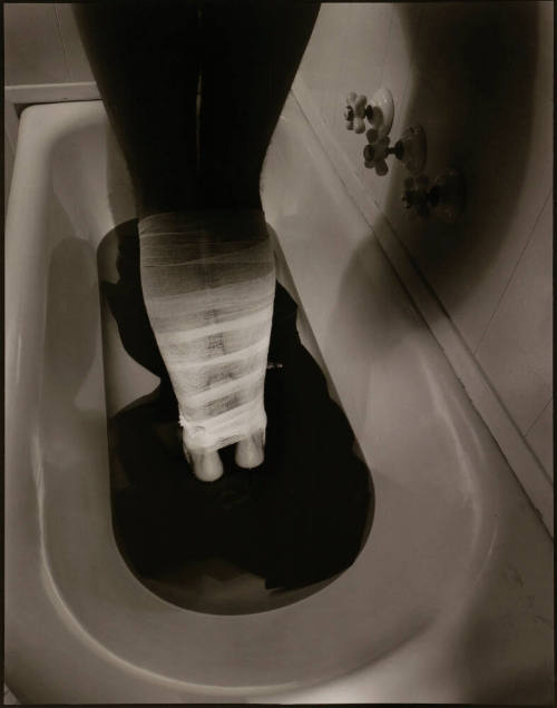 Untitled (wrapped legs in bath)