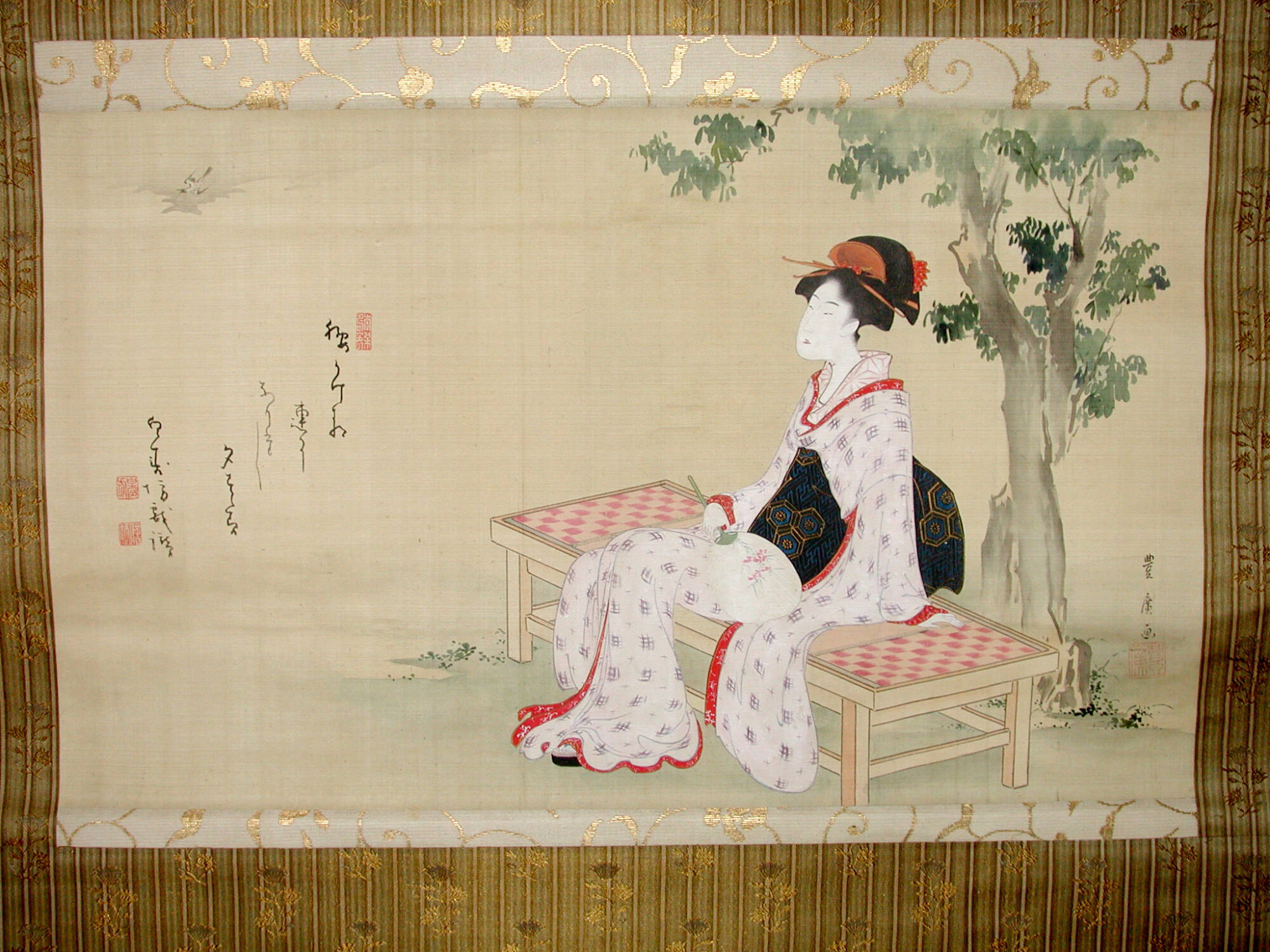 Young Woman Seated in a Garden