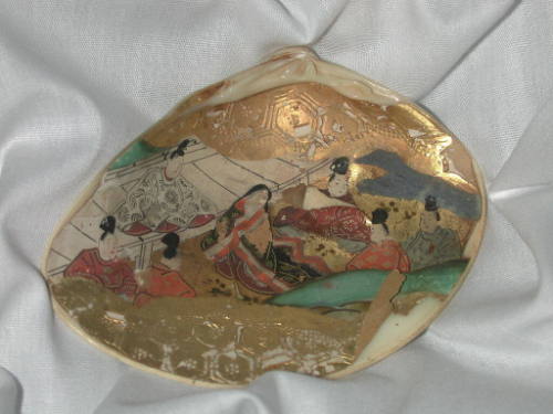 Clam Shells Decorated with Scenes of a Tale