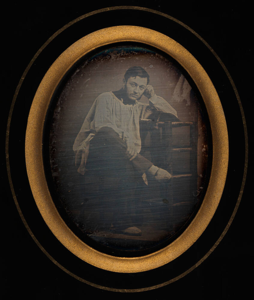 Portrait of man in artist's smock