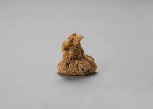Small bag of burnt grain