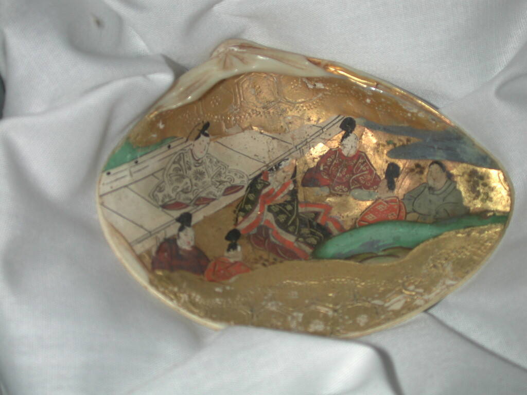 Clam Shells Decorated with Scenes of a Tale
