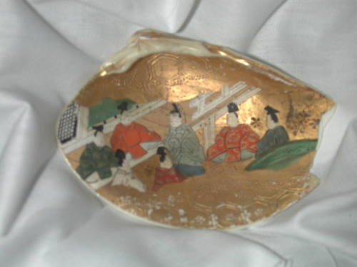 Clam Shells Decorated with Scenes of a Tale