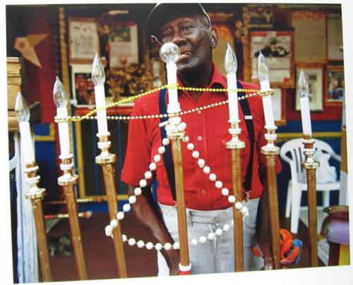 Reverend H. D. Dennis with Candelabra, MS