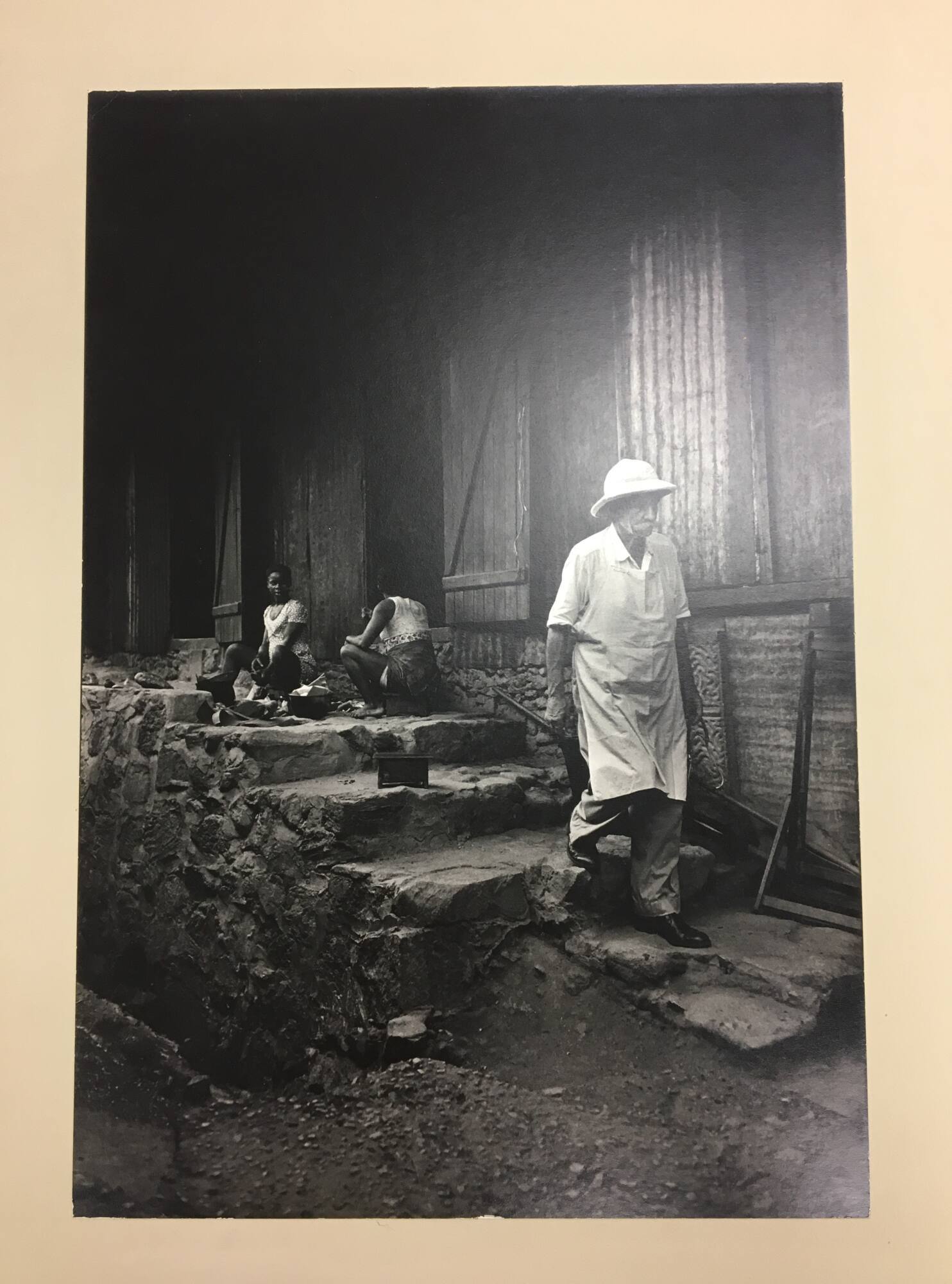 Albert Schweitzer walking down stairs