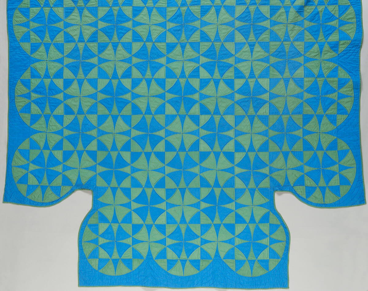 Blue and Green Patchwork Quilt