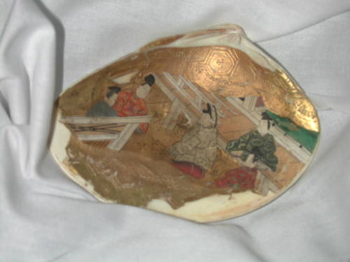 Clam Shells Decorated with Scenes of a Tale