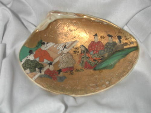 Clam Shells Decorated with Scenes of a Tale